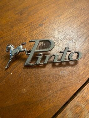 vintage Ford Pinto car emblem script badge
OEM part D12B-16B114-AD